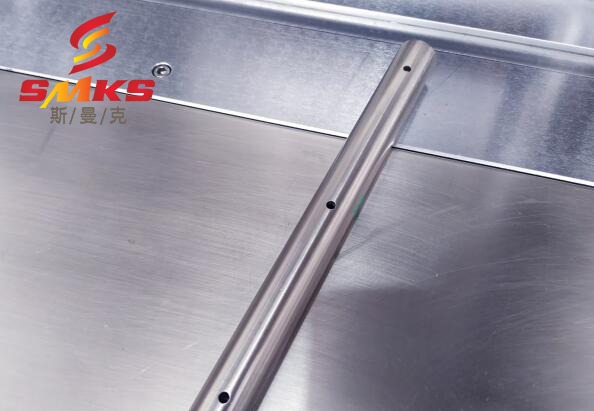 汽油共軌管內(nèi)孔去毛刺，都用斯曼克高速磨粒流